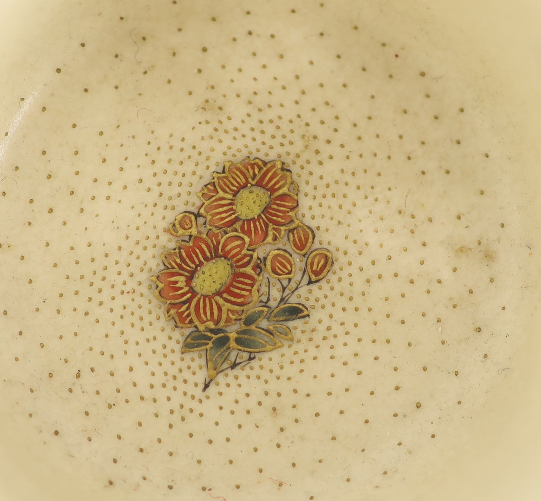 A Japanese Satsuma pottery cup and saucer, signed Seikozan, Meiji period, 11cm diameter